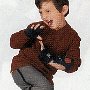 Ads With Little Kids Wearing Chucks  Boy wearing black high tops.