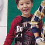 Ads With Little Kids Wearing Chucks  Young boy wearing black chucks.