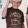 Ads With Little Kids Wearing Chucks  Young boy wearing brown chucks.