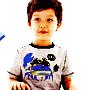 Ads With Little Kids Wearing Chucks  Boy wearing black low cut chucks.