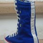 Knee High Chucks  Angled rear view of a left royal blue and pattern knee high.