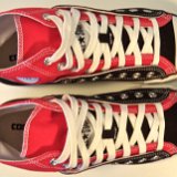 Layer Up High-Low Chucks  Top view of black and red layer up high tops with white shoelaces.