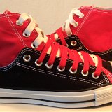 Layer Up High-Low Chucks  Outside views of black and red layer up high tops with red and white shoelaces.