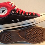 Layer Up High-Low Chucks  Inside patch and sole views of black and red layer up high tops with red and white shoelaces.