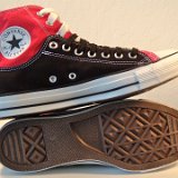 Layer Up High-Low Chucks  Inside patch and sole views of black and red layer up high tops with black and white shoelaces.