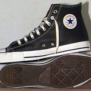 Leather Chucks  Black leather high tops, inside patch and sole views.