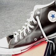 Leather Chucks  Right black leather high top, angled inside patch view.