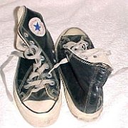 Leather Chucks  Worn black leather high tops, top view from front and rear.