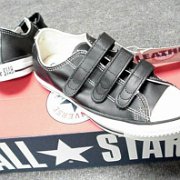 Leather Chucks  Black leather low cuts with velcro straps, top and rear views.