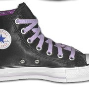 Leather Chucks  Inside patch view of a left black leather high top with purple laces and racing stripe.