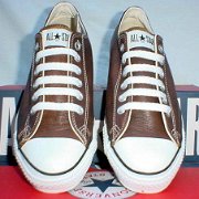 Leather Chucks  New brown leather low cuts with box, top view.