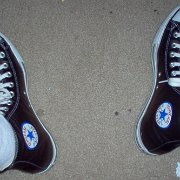 Leather Chucks  Wearing black leather high top chucks, top view.
