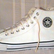 Leather Chucks  White leather jewel high tops, side views.