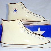Leather Chucks  White patent leather high tops, side views.