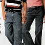 Ads for Levis and Jeans  Ad for navy blue jeans with black and pink chucks.