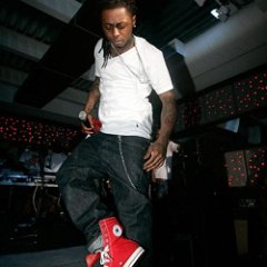 Lil Wayne  Lil Wayne wearing red extra-high top chucks.