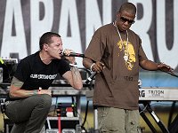 Linkin Park  Chester Bennington rocking with JayZ wearing black chucks.