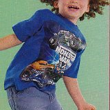 Little Kids Wearing Chucks  Young boy wearing navy blue low cut chucks.