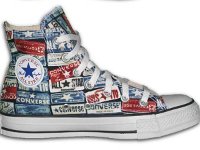 Chucks With Repeated Logo Pattern Uppers  Inside patch view of a left red, white and blue logo print high top.