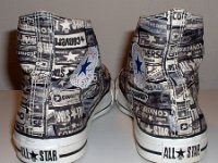 Chucks With Repeated Logo Pattern Uppers  Rear view of black and white heel patch print high tops.