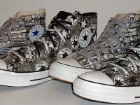 Chucks With Repeated Logo Pattern Uppers  Angled side view of two different pairs of black and white Chuck Taylor logo patch print high tops.