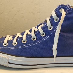 Lightly Worn Royal Blue High Tops, LWH09  Outside view of the left royal blue high top.