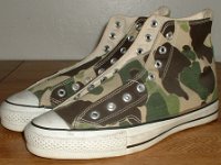 Mark Recob Vintage Chucks Collection  Angled side view of olive drab camouflage vintage Chuck Taylor All Star high tops.