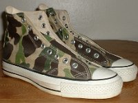 Mark Recob Vintage Chucks Collection  Angled side view of olive drab camouflage vintage Chuck Taylor All Star high tops.