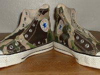 Mark Recob Vintage Chucks Collection  Angled front view of olive drab camouflage vintage Chuck Taylor All Star high tops.