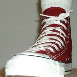 Maroon High Top Chucks  Stepping out in maroon high tops, front view.