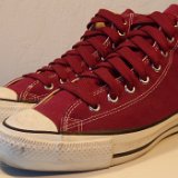 Maroon High Top Chucks  Angled side view of maroon made in USA high tops with fat maroon shoelaces.