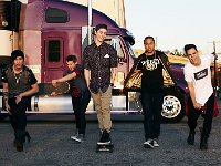 Midnight Red  The band in front of a semi truck.