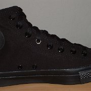 Monochrome Black Chucks  New left monochrome black high top, made in China, inside patch view.