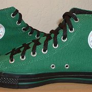 Monochrome Black Chucks  Goth model chucks are built on the monochrome style, but with two colors and standard side patches, like these 2005 green and black high tops.