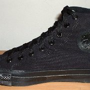 Monochrome Black Chucks  New monochrome black high top, made in USA, right inside patch view.