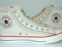 Multicultural High Top Chucks  Inside patch views of parchment with red, blue, and orange trim multicultural high tops.