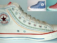 Multicultural High Top Chucks  Inside patch view of a right parchment multicultural high top with insets of the blueberry and hibiscus models.