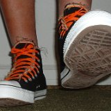 Multilayer High Top Chucks  Wearing black multilayered high tops. front view shot 3.