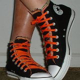 Multilayer High Top Chucks  Wearing black multilayered high tops. front view shot 4.