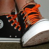 Multilayer High Top Chucks  Wearing black multilayered high tops. right side view shot 2.