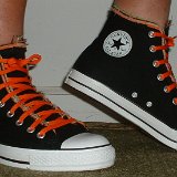 Multilayer High Top Chucks  Wearing black multilayered high tops. right side view shot 3.