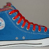 Multilayer High Top Chucks  Inside patch view of a left royal blue multilayered high top with red laces.