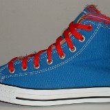 Multilayer High Top Chucks  Outside view of a left royal blue multilayered high top with red laces.