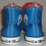 Multilayer High Top Chucks  Rear view of royal blue multilayered high tops with red laces.