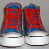 Multilayer High Top Chucks  Front view of royal blue multilayered high tops with red laces.