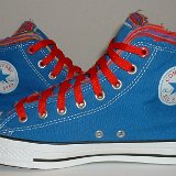 Multilayer High Top Chucks  Inside patch views of royal blue multilayered high tops with red laces.