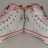 Multilayer High Top Chucks  Angled front view of red and white multilayer high tops.