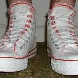 Multilayer High Top Chucks  Wearing red and white multilayer high tops, front view 1.