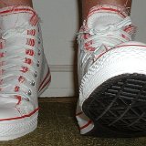 Multilayer High Top Chucks  Wearing red and white multilayer high tops, front view 3.