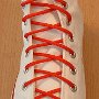 Narrow Round Shoelaces  Optical white high top with narrow red laces.